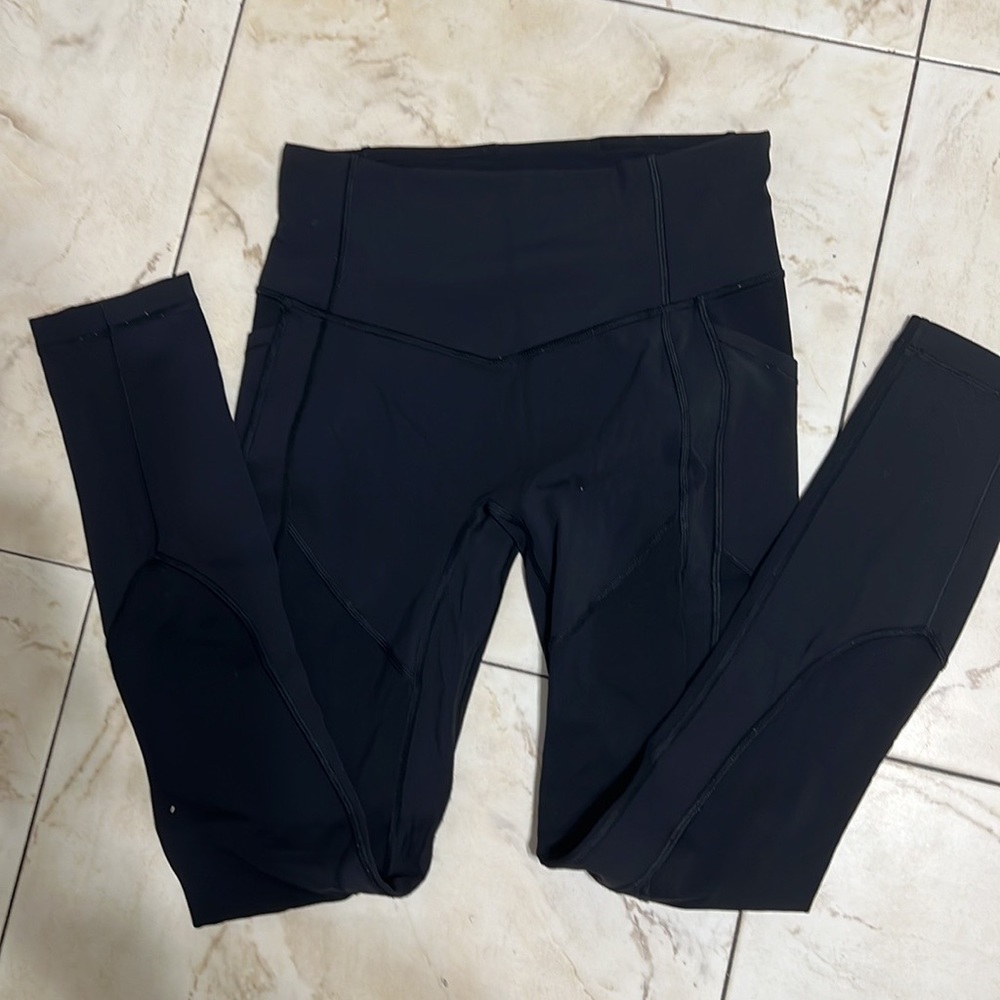 Lululemon leggings with pockets and stitching